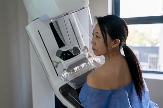 Woman getting mammogram